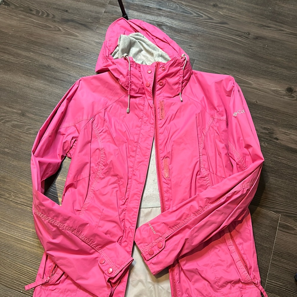 Bright pink Columbia rain jacket
